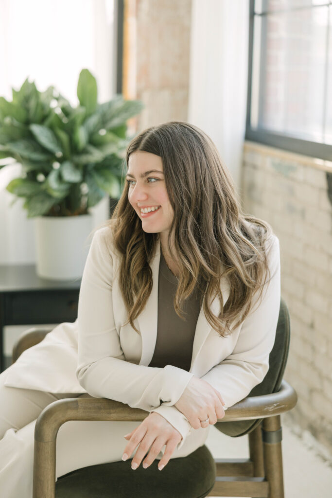 Editorial-style headshot of realtor in Studio North during brand photoshoot