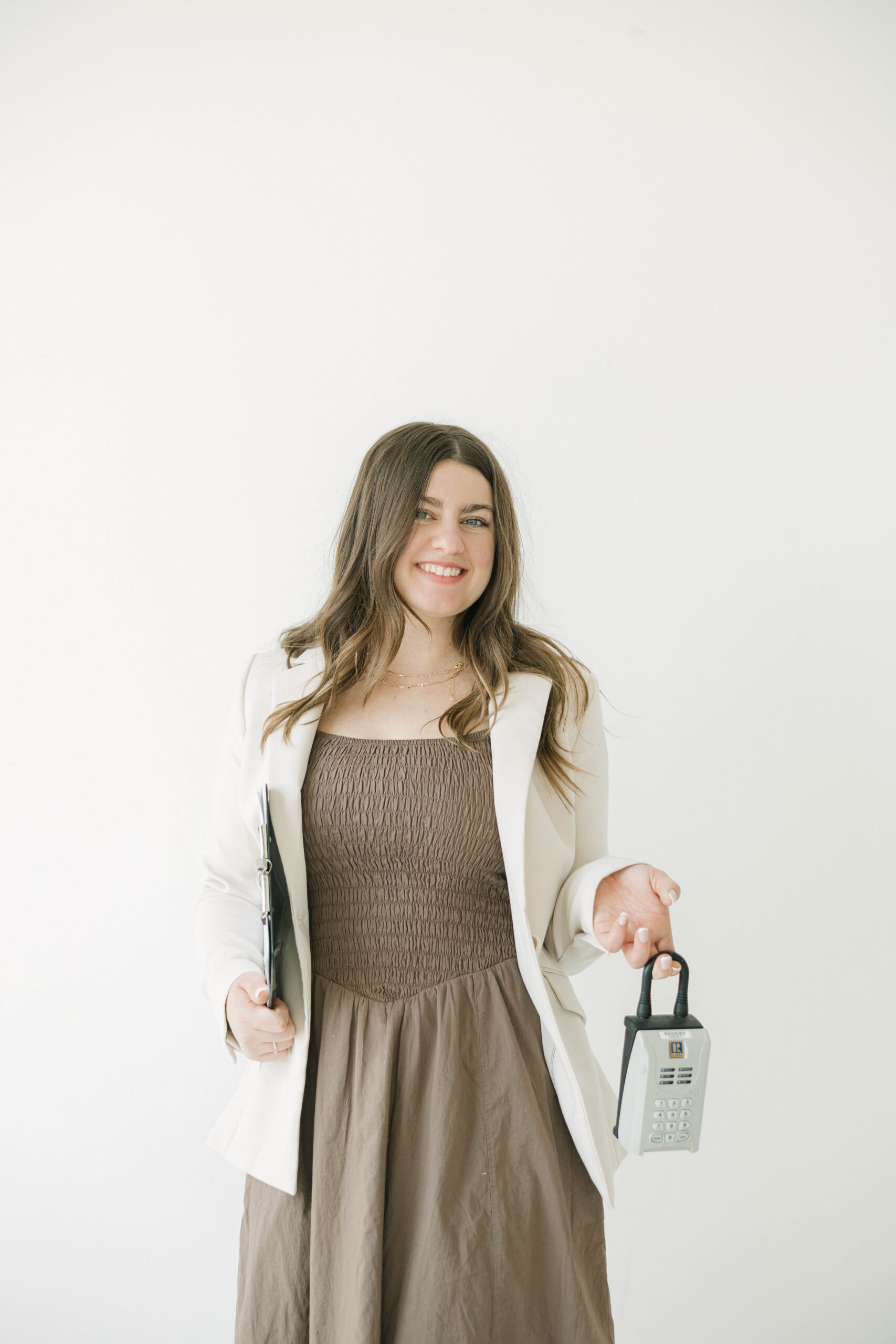 Confident portrait of real estate agent during brand photoshoot at Studio North