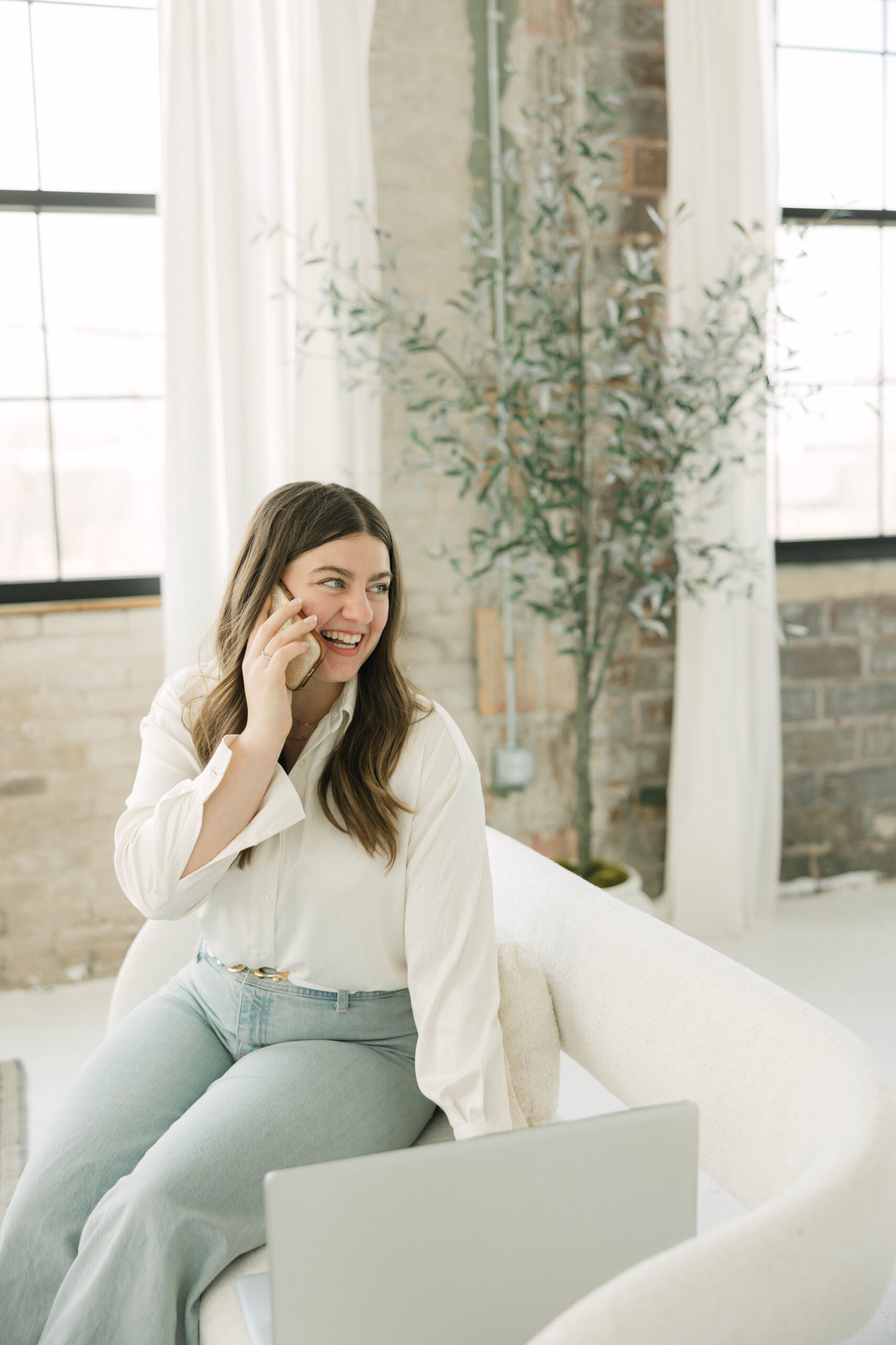 Candid brand photo of Milwaukee realtor at Studio North during personal branding shoot