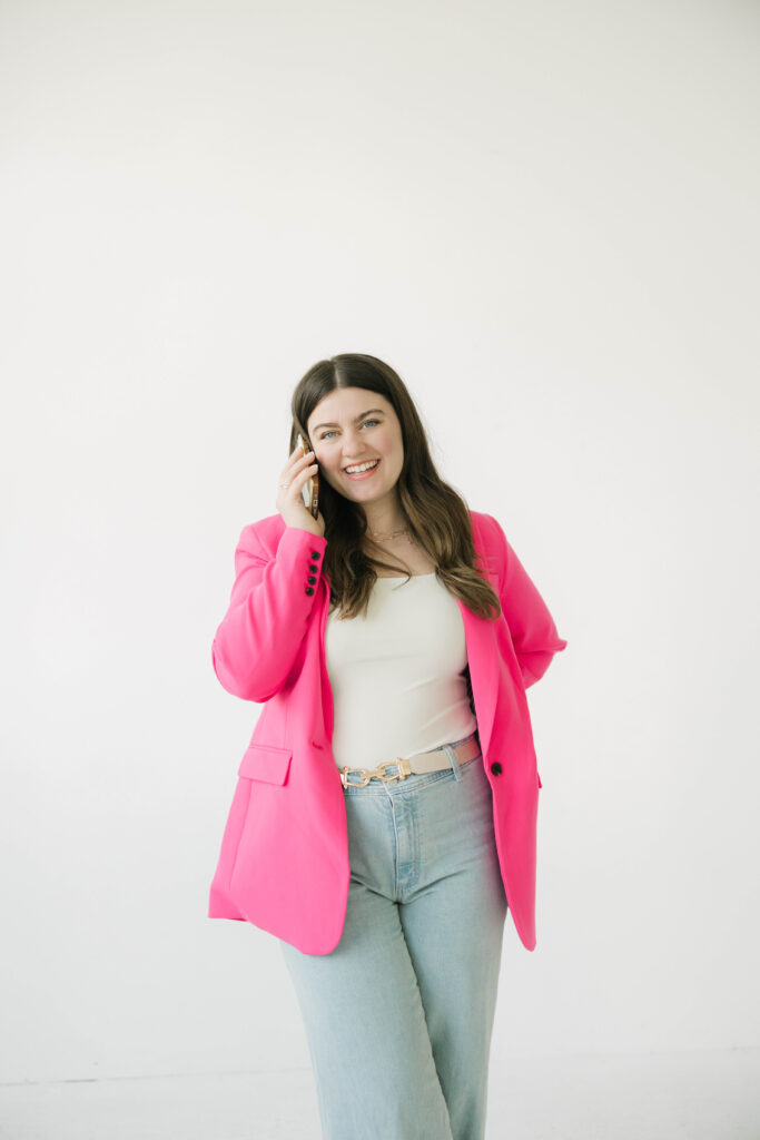 Pink blazer outfit during Milwaukee realtor branding photoshoot for bold, feminine touch