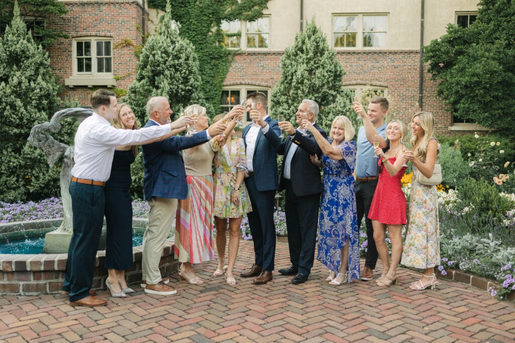 Family and friends celebrating a newly engaged couple at The American Club in Kohler