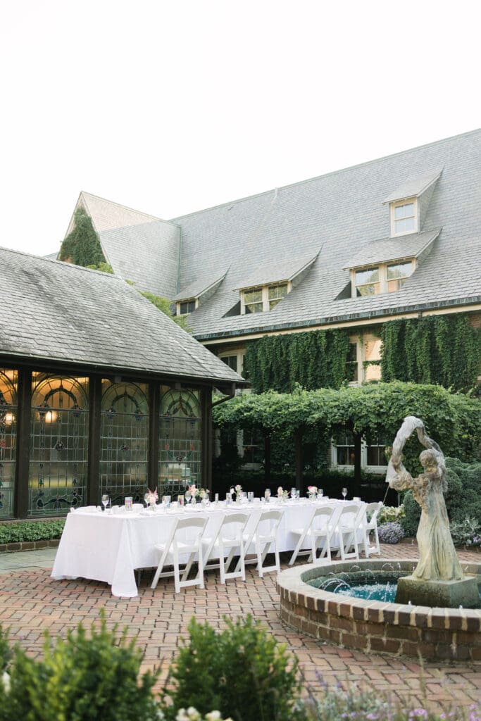 Elegant dinner party tablescape at The American Club following an engagement proposal