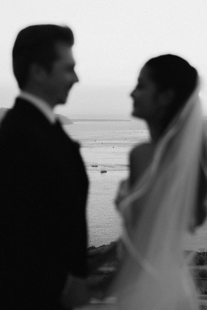 bride and groom overlooking the aegean sea