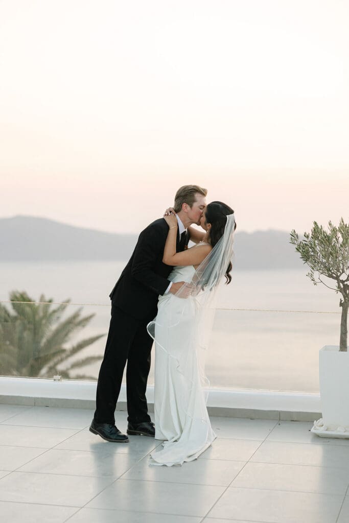 golden hour portraits overlooking Santorini
