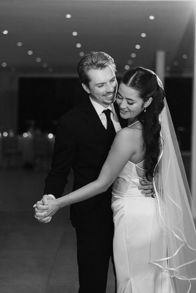 Bride and groom sharing their first dance at Le Ciel in Santorini, Greece.
