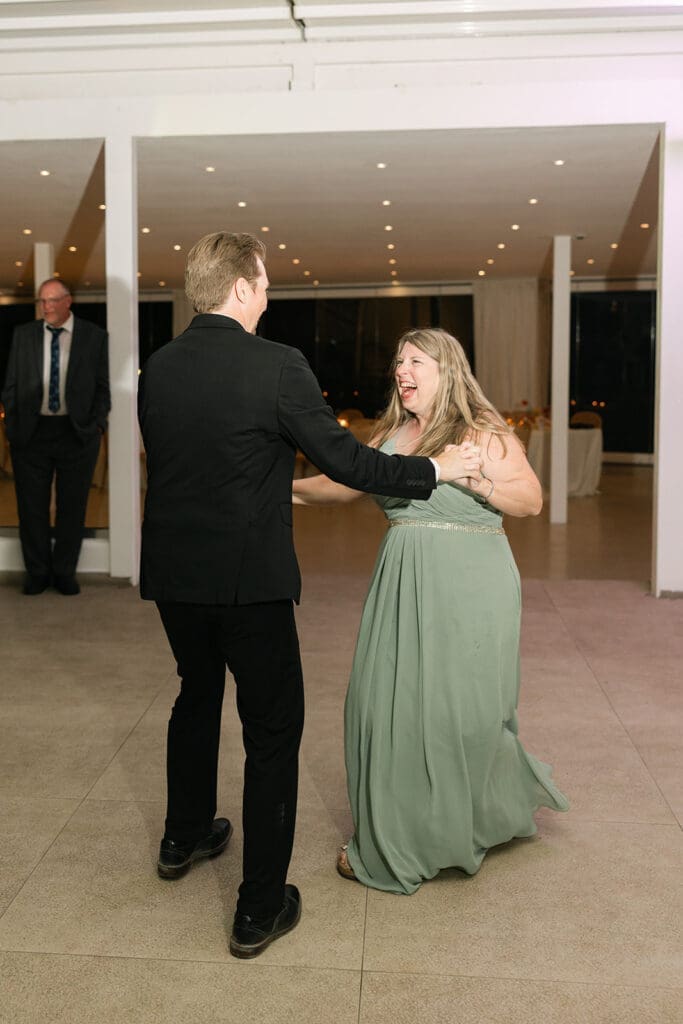 Mother son dance during Santorini wedding 