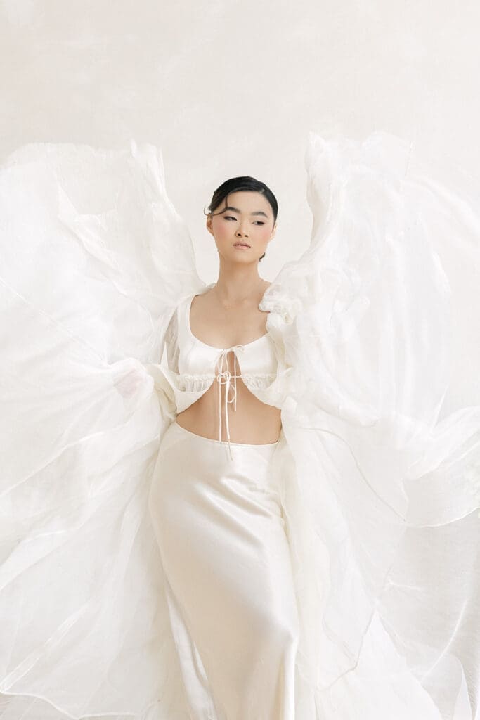 high fashion bridal movement Chicago wedding editorial in studio setting