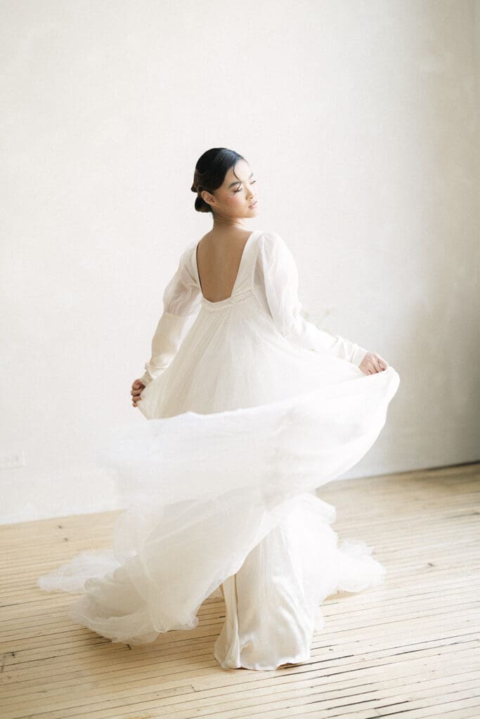 twirling bride Chicago wedding editorial with expressive gown movement